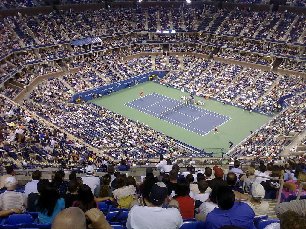 Crowd in a full tennis stadium